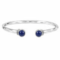 Bracciale rigido aperto con pietre blu eleganti